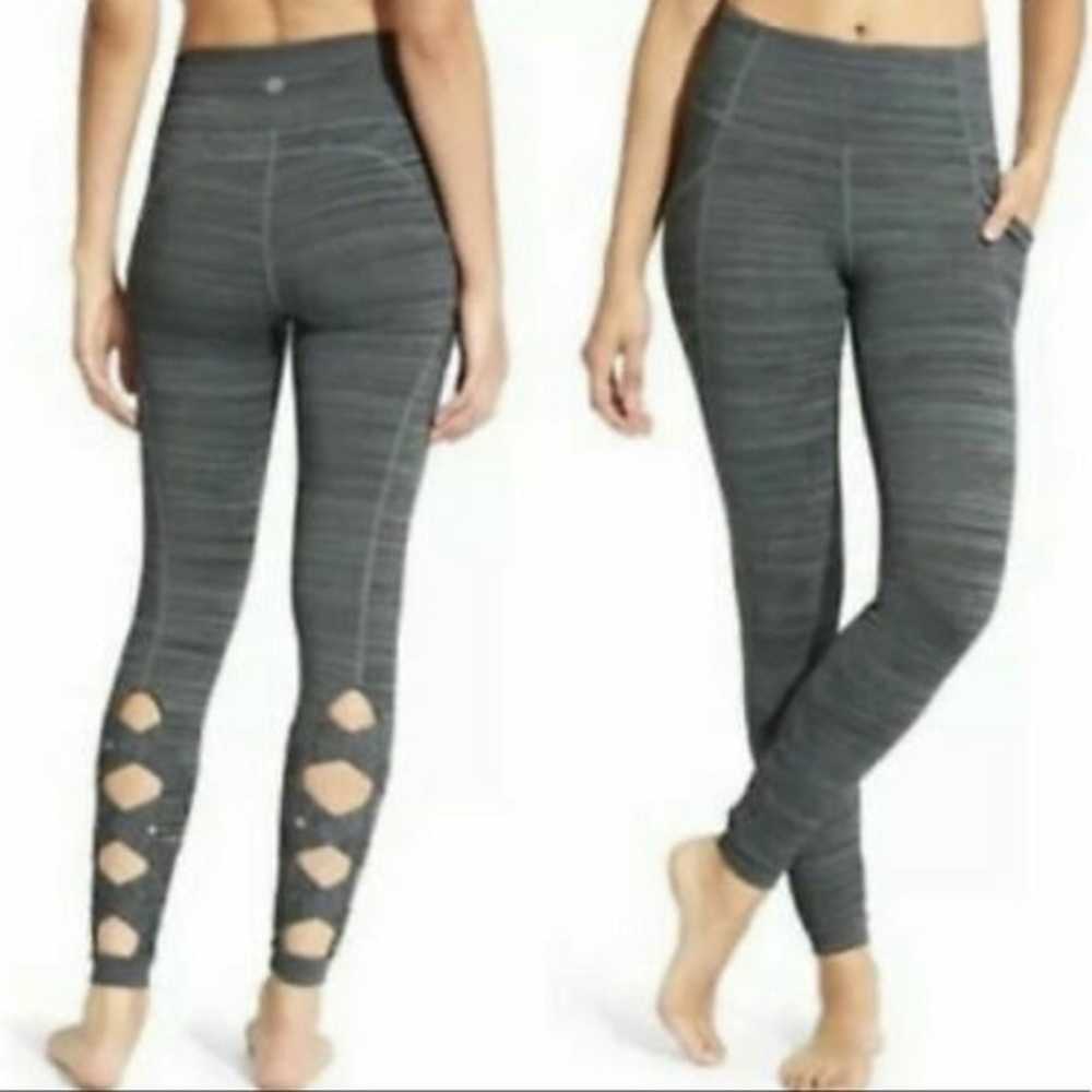 Athleta heathered gray, stash side pockets, bandage criss cross back ankle sz M